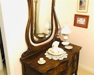 Antique serpentine low dresser with harp mirror