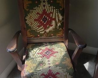 upholstered rolling chair with arms