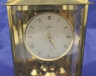 72 - Schatz Germany Brass Clock w/ key 8 1/2" x 5"
