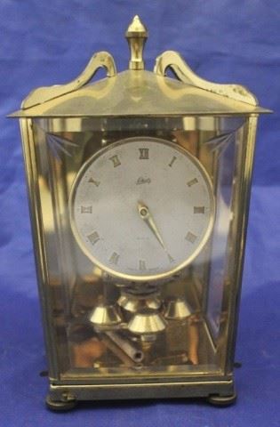 72 - Schatz Germany Brass Clock w/ key 8 1/2" x 5"
