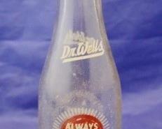 441 - Dr. Wells soda bottle 8" tall

