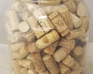 781 - Plastic container full of wine bottle corks
