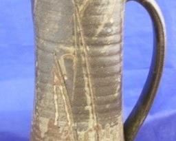 1041 - Signed art pottery pitcher 12 1/2" tall
