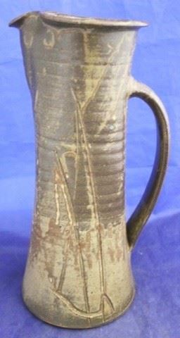 1041 - Signed art pottery pitcher 12 1/2" tall
