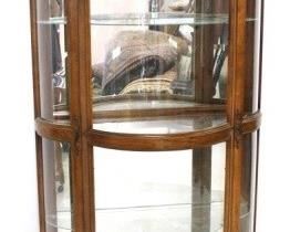 1500 - Curved glass curio cabinet 69 1/2 x 35 1/2
