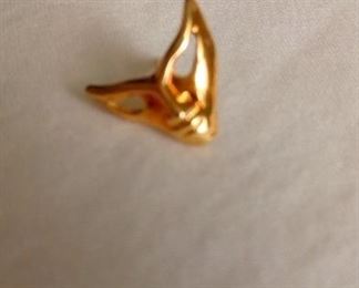 gold face pin