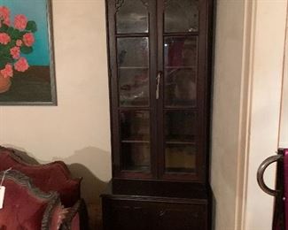 1 of 2 8.5 ft tall Victorian glass faced cabinets 