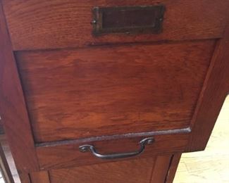 Wooden File cabinet.