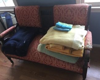 Blankets and Victorian sofa.