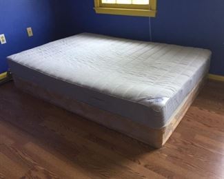 Double mattress and box spring.