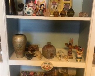 Skulls, mushroom sculptures , signed vases, action figures, vintage tops, Asian vase