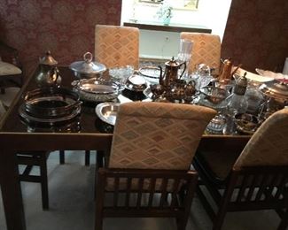 Henredon Dining room table and chairs and silverplate items and glassware