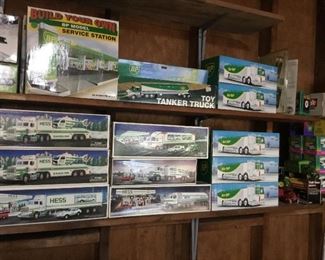 Large collection of toy trucks in boxes 