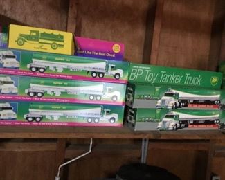 Large collection of toy trucks in boxes 