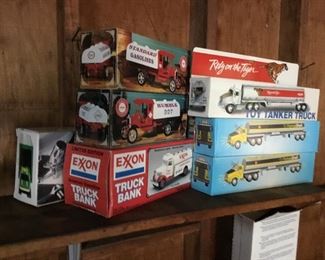 Large collection of toy trucks in boxes 