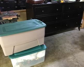 Bins of Christmas items, dresser