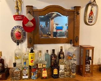 Neither of the bottles to the far left or right of group is there.  Owners took for their new bar...sorry