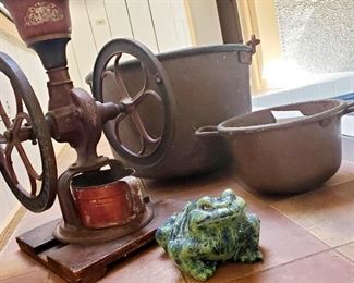Coffee grinder, large copper pots, ceramic frog