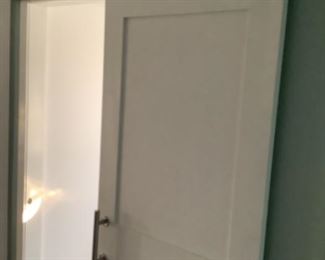 Large , modern, white barn door 