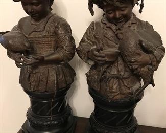 Love these bronze figurines. Approx 100 years old. One has a hairline crack.  Very heavy.
