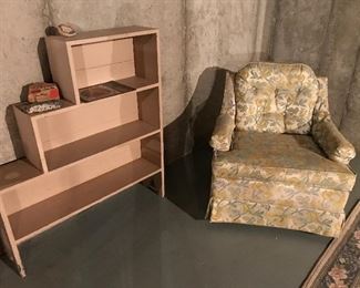 Nice little wood bookshelf.  Nice over stuffed chair