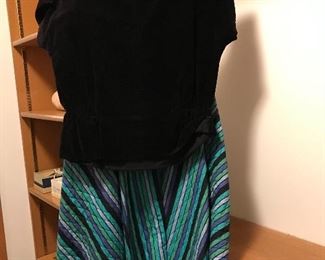 Her husband purchased this for her to wear to a dance.  Beautiful velvet top and quilted skirt.