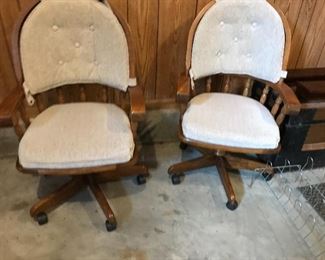 2 nice swivel padded chairs