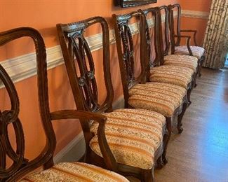 6 Sculptured chairs to go along with the dining room table