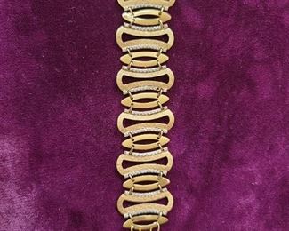 21k gold bracelet 23.6 grams, length is 7.5 inches. $1390