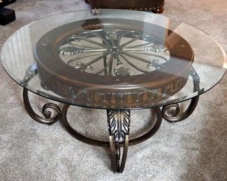 Round Beveled Glass Topped Cocktail Coffee Table With Scrolled Metal Legs And Wood Trim Accents, 19" x 42" Diameter