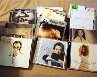 CD Assortment Including Artists, Bob Dlan, James Taylor, Elton John, Nickle Creek, Tears For Fears, And More Qty Approx 75 CDs, Includes 26" Rack