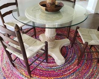 Pedestal Glass Top Table and 4 chairs with Rush Seats. Beautiful Colorful Rag Rug.
