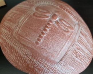 It rattles and it is signed