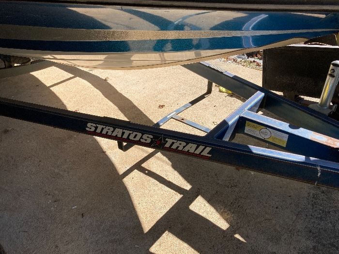 Stratos bass boat w/trailer & Johnson outboard motor