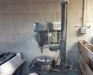 Industrial sized drill press used in factory