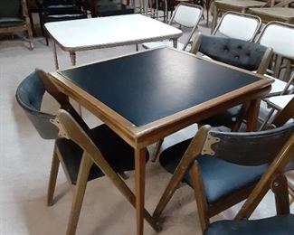 Two sets of card tables with chairs