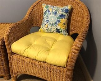 Pier 1 Wicker chair. Comes with 2 cushions/pillow sets. 28" wide x 34" tall. 16" floor to top of wicker seat. 19.5" floor to top of cushion. Asking $125