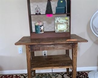 Vintage  shelf backed with Chicken wire.                       Indoor out RUG.   ANTIQUE Wooden Folk Art Table