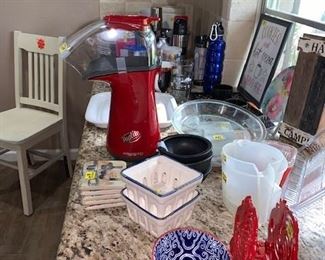 Kitchenware. Cute White Sturdy Chair in the background