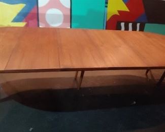Danish Teak dining table with 4 leaves