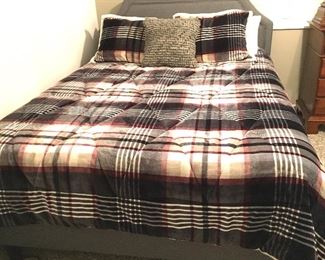 Ugg queen size comforter on gray platform bed