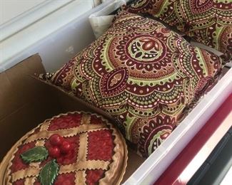 Vintage pie plate and outdoor decorative pillows