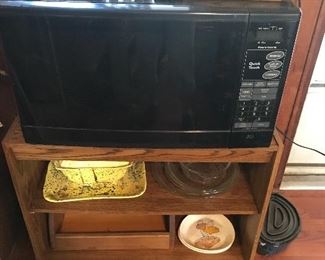 Microwave and a lot of vintage Nut Crackers