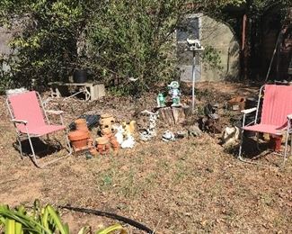 Outside Pots, Chairs and Bird House