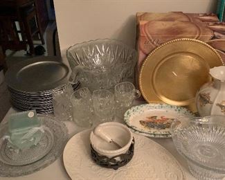 Lenox platters, Mikasa crystal bowls, glass punch bowl with cups, 20 silver plate chargers lightly used, 16 gold plate chargers brand new never used, Lenox vase, and more…