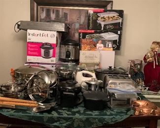 Most things are brand new/lightly used. Waffle iron, pressure cooker (brand new), table too toaster oven (brand new), buffet chafing dishes (brand new), hand mixer, pasta maker, platters, mini food processor and more…