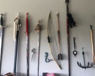 Small display of swords and a great old fishing hook