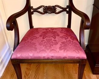 Close-up of upholstered Damask seats on Mahogany Dining room chairs