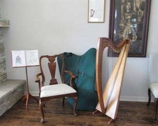 Sligo compact 36 string cherry stave back Harp with carrying case.  Antique sepia print of Joan of Arc from the 1910s.