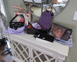 Designer purses and shoes, many new with tags.